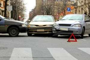 Three cars in a multi-vehicle pile-up