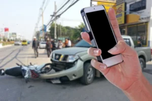 Taking Picture of Motorcycle Accident - Motorcycle Accident Settlement