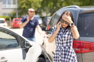 Man and Woman on Phone After Accident - Information