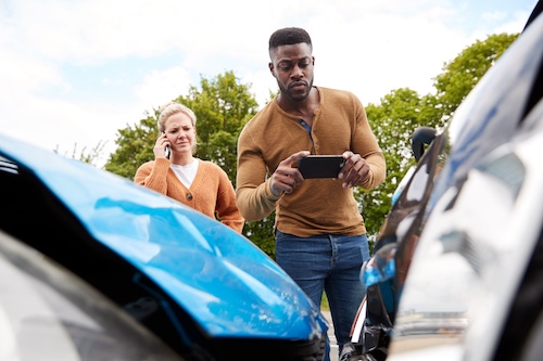 Man Getting Car Accident Evidence - Information To Get After a Car Accident In Georgia