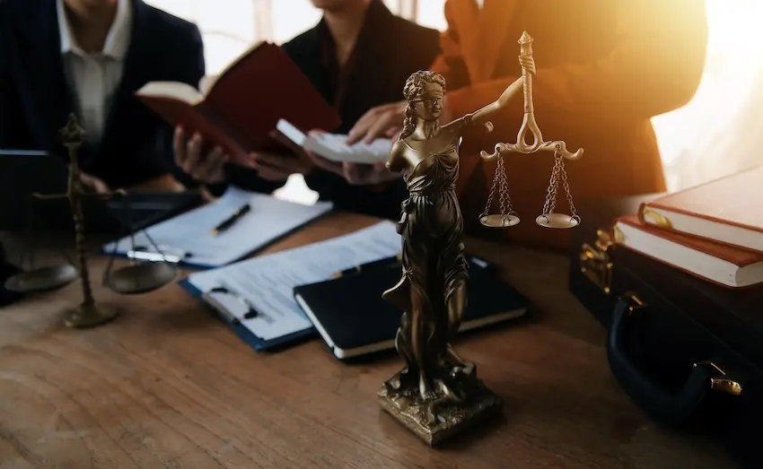 Local Atlanta car accident lawyer meeting injured client face-to-face at Atlanta Metro Law office for personalized legal representation