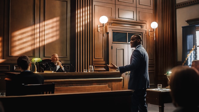 Atlanta personal injury attorney presenting car accident case evidence to jury during trial litigation after failed settlement negotiations