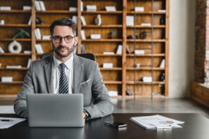 Seasoned trial lawyer in courtroom prepared to litigate car accident case for maximum settlement