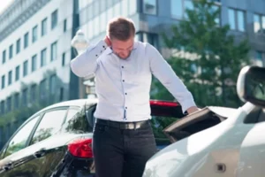 Car accident victim seeking help from settlement car accident lawyer.