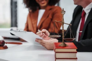 Experienced Georgia personal injury attorney meeting with injured accident victim to discuss compensation claim